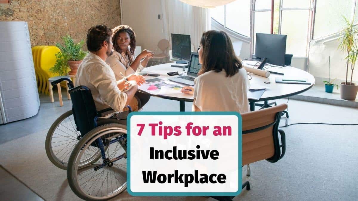 Employees discussing inclusive workplace practices in a team meeting