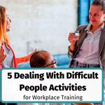 Employees discussing a workplace issue during a dealing with difficult people training activity